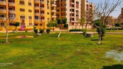 "الإسكان" تعلن غمر الحدائق العامة بالمدن الجديدة بالمياه لمنع التجمعات الخاصة