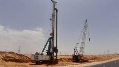 بدء تنفيذ يوترن علوي أمام مدخل مدينة الشروق 2 على طريق السويس 