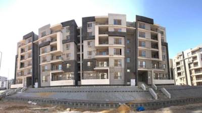 رغم إعلان تسليم 1656 وحدة اليوم.. عدم انتهاء أعمال تنسيق موقع «دار مصر الأندلس» (صور)