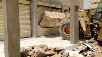 صور|| حملات إزالة لمخالفات البناء في "بدر والشروق"