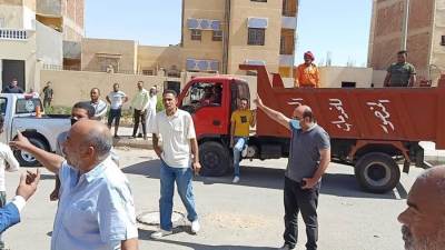 صور|| حملة رفع إشغالات وإزالة مباني مخالفة في "حدائق أكتوبر"