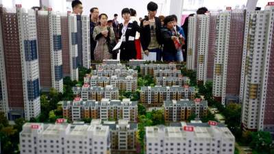 الديوان والتظاهرات تحاصر أكبر مجموعة عقارية صينية 