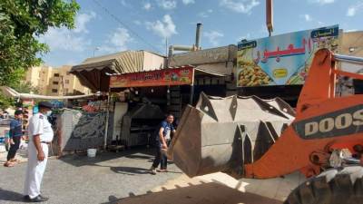 جهاز العبور ينفذ عدد من قرارات الإزالة وتصحيح الأوضاع في أحياء المدينة