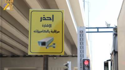 تركيب إشارات مرور مزودة بكاميرات إلكترونية بتقاطع الطريق الدائري الأوسطي مع المحور المركزي بمدينة 6 أكتوبر