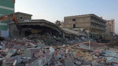 جهاز مدينة أكتوبر يزيل التعديات على أرض «دار أم القرى للأيتام» سابقا 