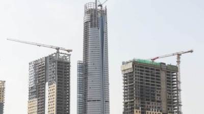 انتهاء جميع الهياكل الرئيسية للأبراج بمنطقة الأعمال المركزية بالعاصمة الإدارية الجديدة