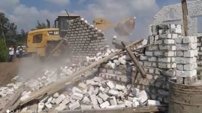 إزالة بناء مخالف على مساحة  120م جنوب بورسعيد 