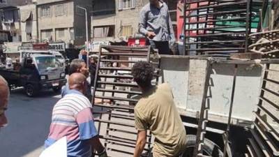 إزالة أكشاك مخالفة ورفع 300 حاله اشغال واستاندات ببولاق الدكرور بالجيزة 