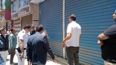 غلق معارض بدون ترخيص وإيقاف أعمال تحويل شقة من سكني إلى تجاري بالمنيا