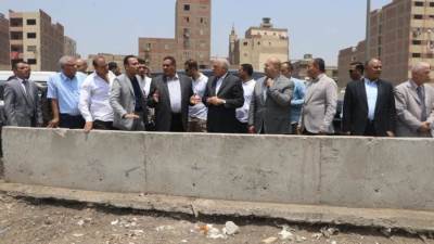 وزير التنمية المحلية ومحافظ الجيزة يفتتحان موقف سرفيس المريوطية الجديد 