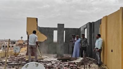 استرداد قطعتي أرض لمخالفة شروط التخصيص وتنفيذ 5 قرارات إزالة لمبانٍ مخالفة بالشروق