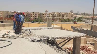 تنفيذ قرارات غلق وتشميع وإزالة مخالفات بناء بمدن 6 أكتوبر والشروق ودمياط الجديدة