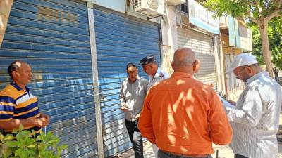 تنفيذ 11 قرار غلق وتشميع وقطع المرافق عن المحلات التجارية المخالفة بمدينة الشروق