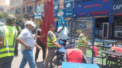 حملات على الإشغالات والتعديات على الطرق بمدن 6 أكتوبر و15 مايو وبدر والشيخ زايد