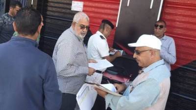 جهاز مدينة دمياط الجديدة ينفذ 48 قرار غلق وتشميع لمعارض سيارات مخالفة 