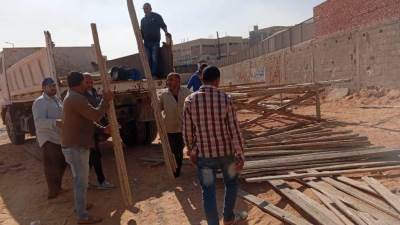 حملات لإزالة الإشغالات وغلق الأنشطة المخالفة بمدن السادات  و15 مايو والعاشر من رمضان  