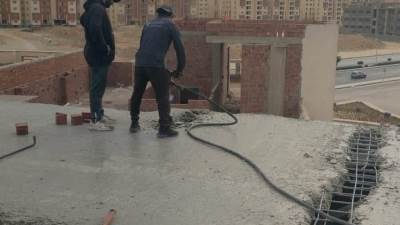 جهاز مدينة القاهرة الجديدة يزيل مخالفة بناء بالتجمع الثالث