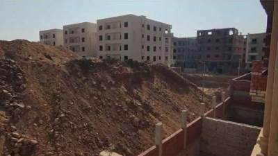 سكان بيت الوطن بمدينة 6 أكتوبر يشكون نقص الكهرباء وتراكم المخلفات